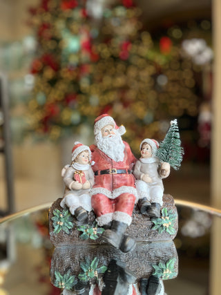 Decoración navideña El Ganso Negro Papá Noel en el baúl 17x12 cm