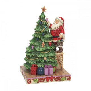 Enesco Christmas Figurine Santa Decorates The Tree